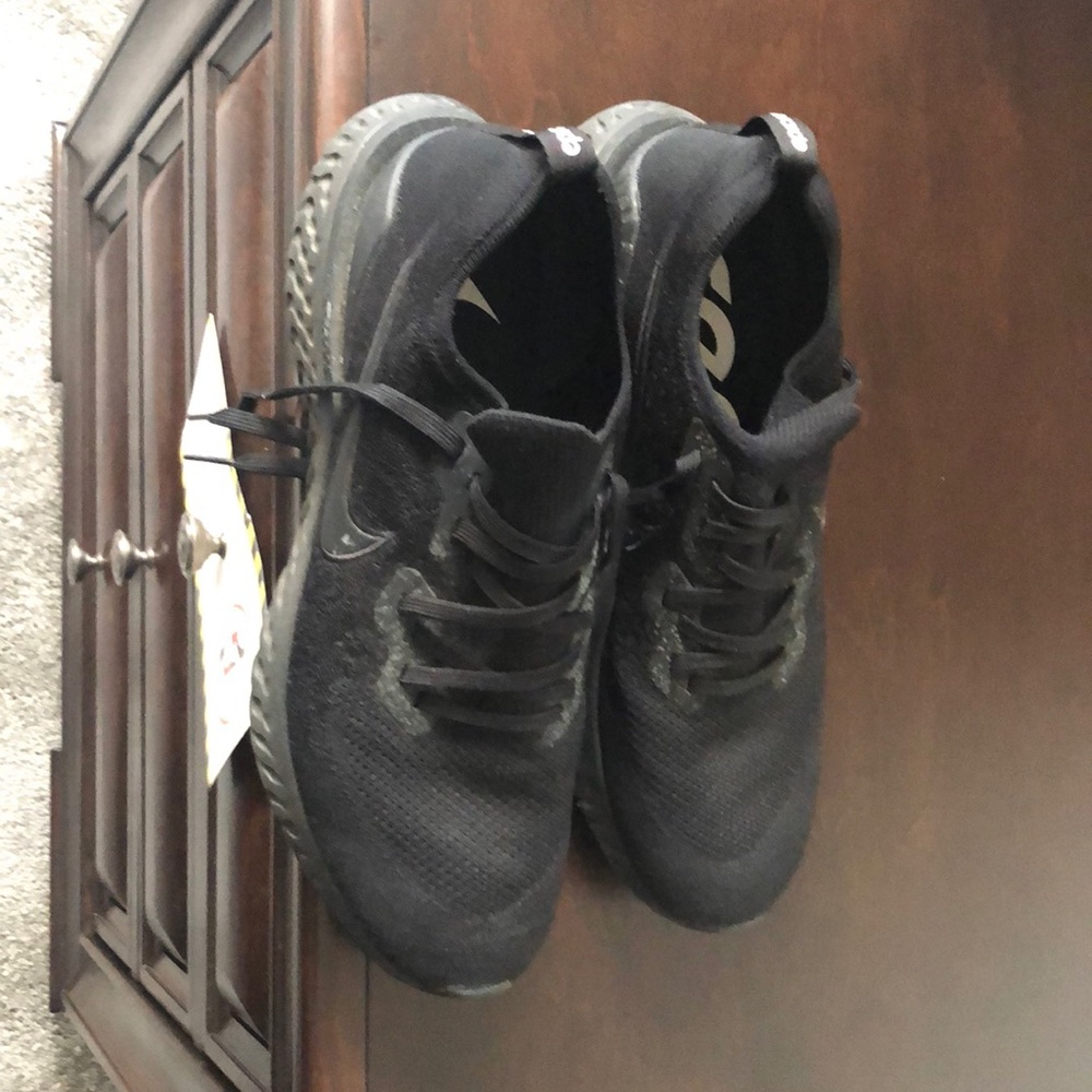 Solid Black Nike walking shoes